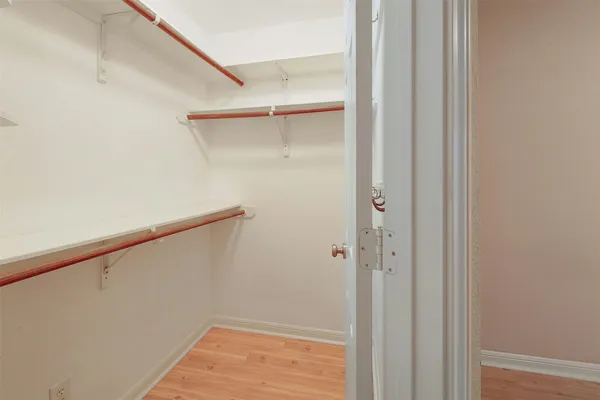 a bathroom with a toilet and a bathtub