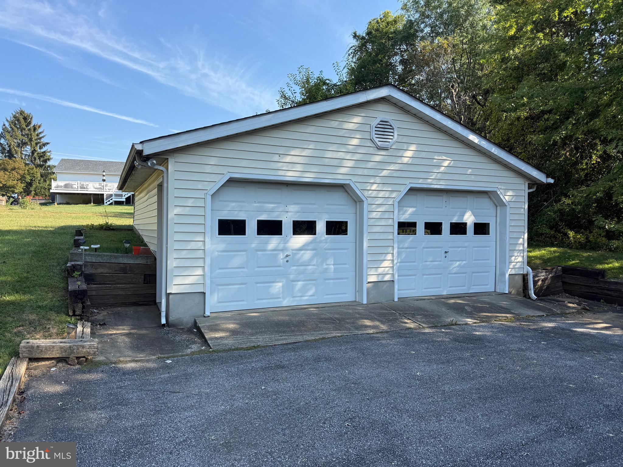 3424 Hampstead Mexico Road Hampstead, MD 21074 - Photo 11 of 26 a front view of a house with a yard
