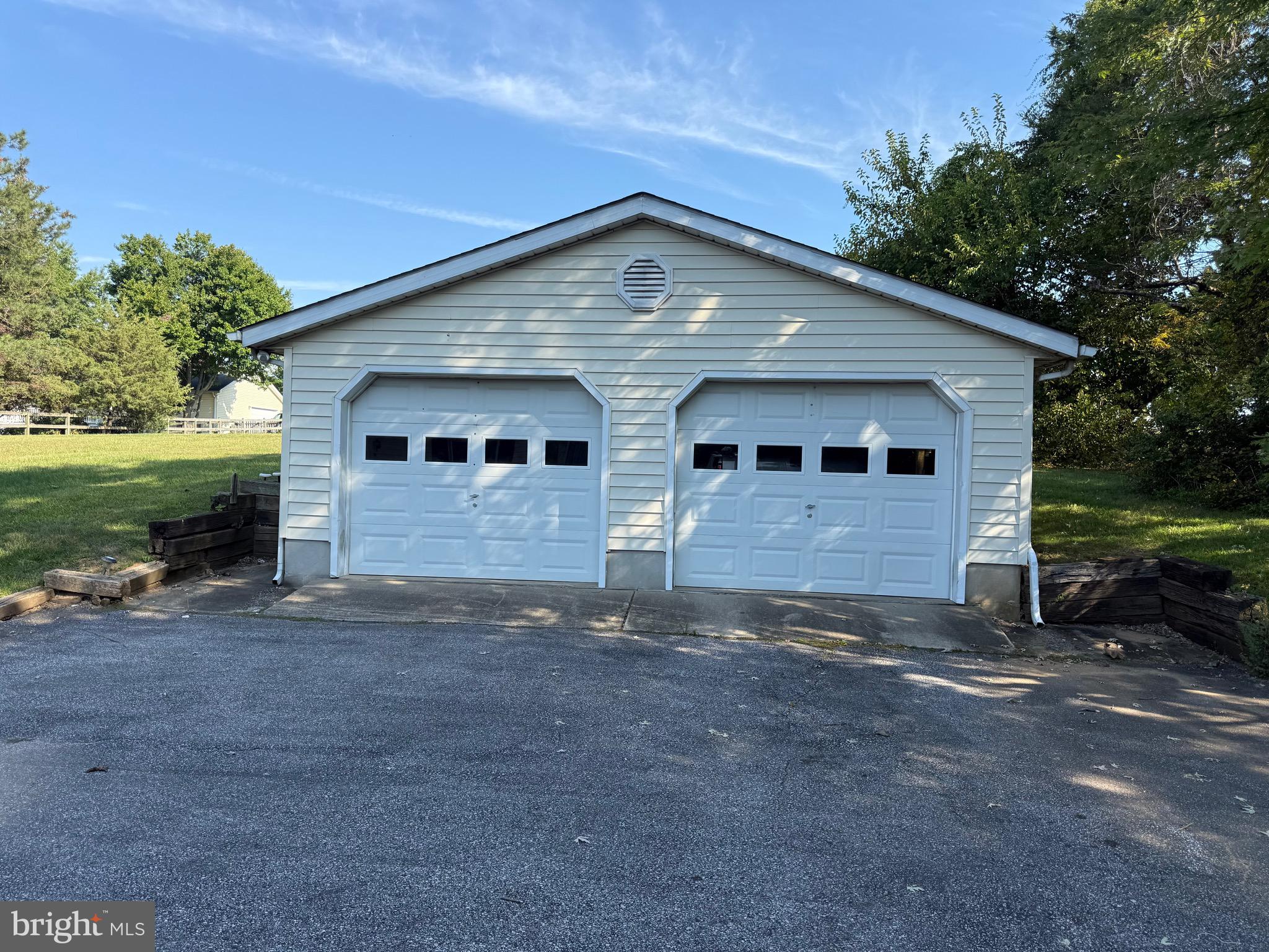 3424 Hampstead Mexico Road Hampstead, MD 21074 - Photo 12 of 26 a front view of a house with a yard