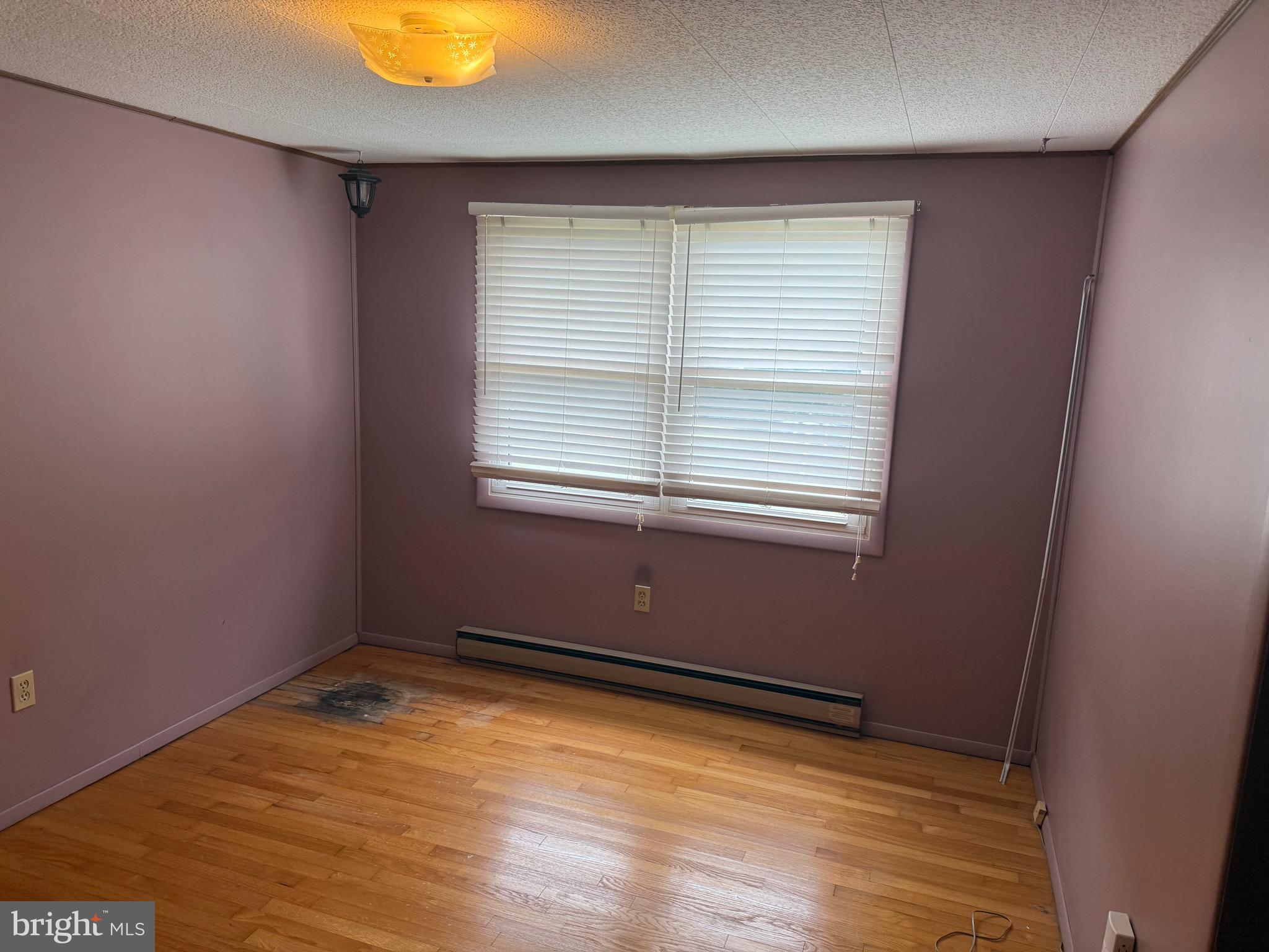 3424 Hampstead Mexico Road Hampstead, MD 21074 - Photo 18 of 26 an empty room with a window