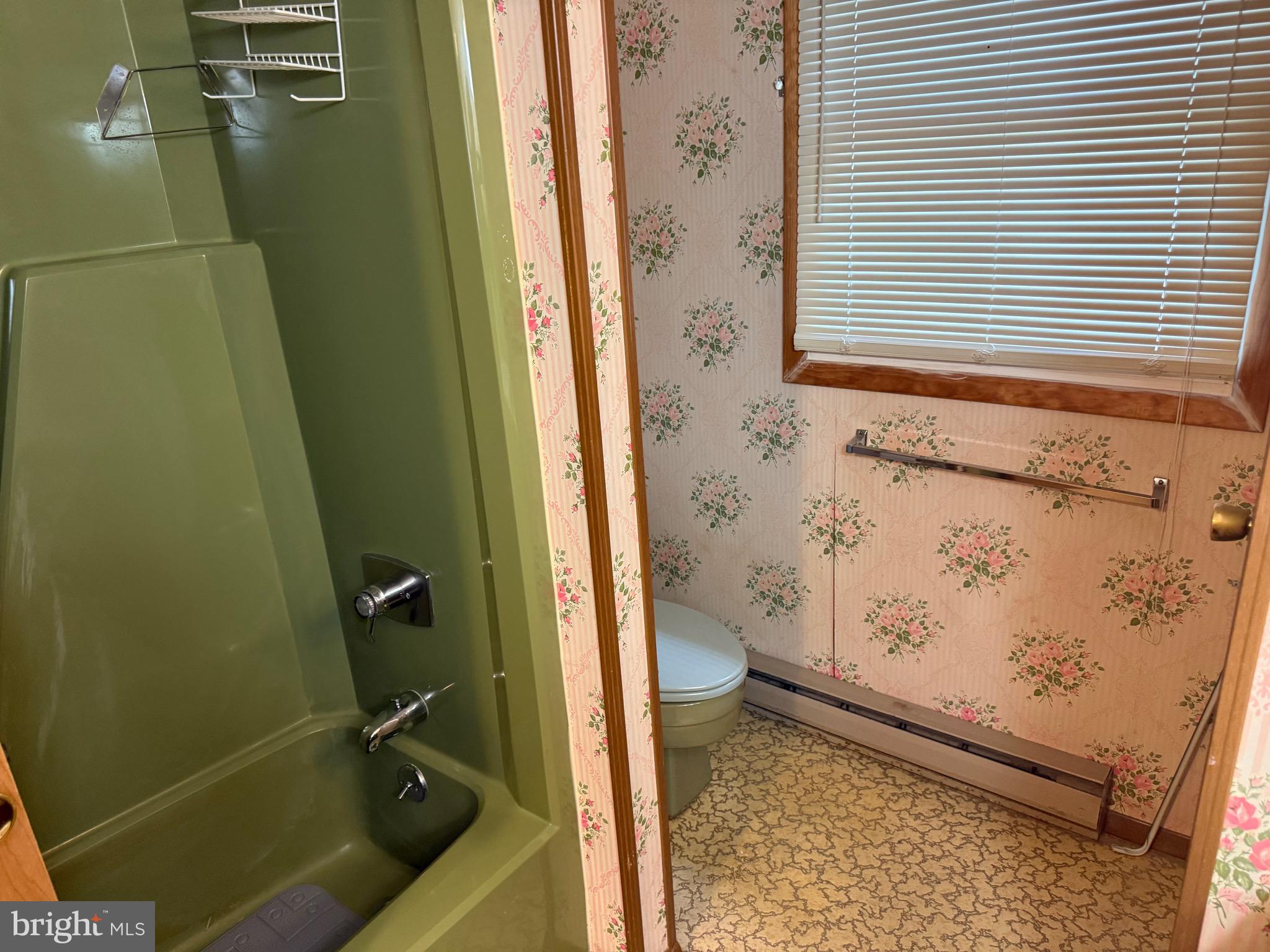 3424 Hampstead Mexico Road Hampstead, MD 21074 - Photo 21 of 26 a bathroom with a toilet and a shower