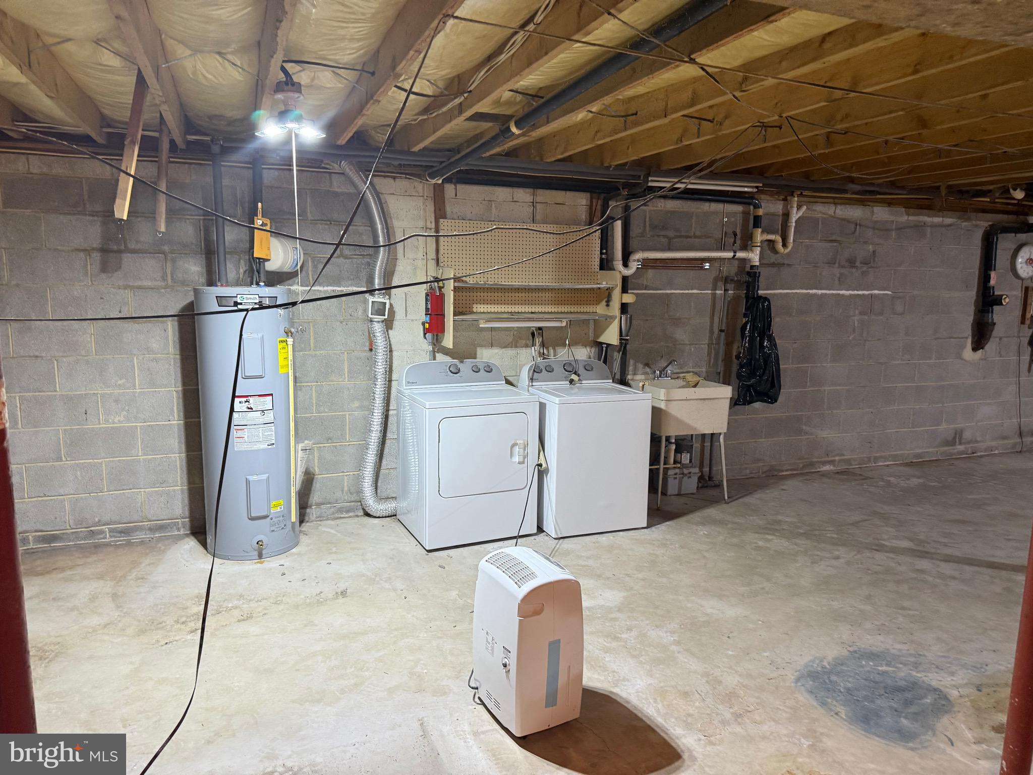 3424 Hampstead Mexico Road Hampstead, MD 21074 - Photo 25 of 26 a utility room with dryer and washer