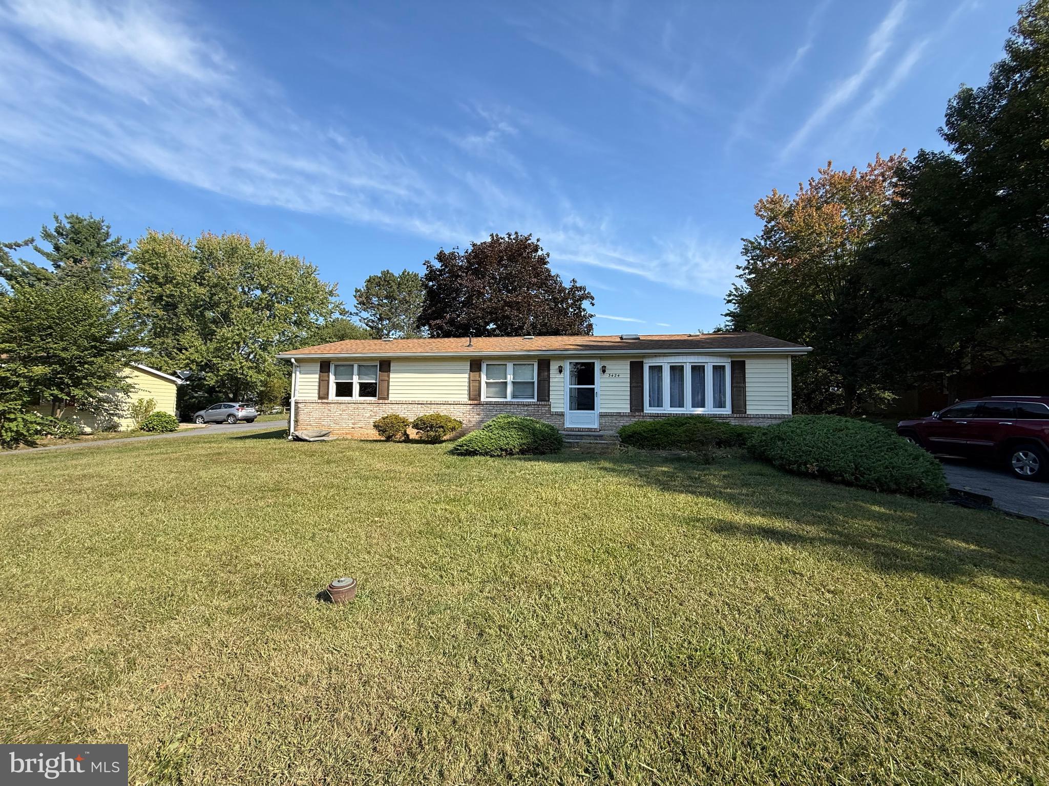 3424 Hampstead Mexico Road Hampstead, MD 21074 - Photo 6 of 26 a front view of a house with a garden