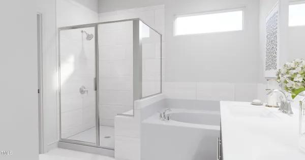 a bathroom with a bathtub a sink and a shower