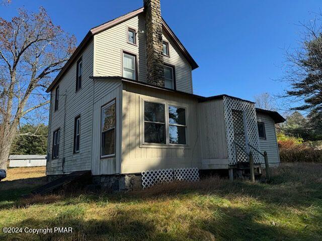 110 Coral Lane Mount Pocono, PA 18344 - Photo 1 of 24 a front view of a house with a yard