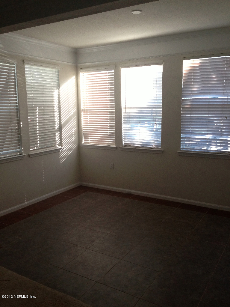 8550 Touchton Road, Unit 717 Jacksonville, FL 32216 - Photo 7 of 15 an empty room with a window