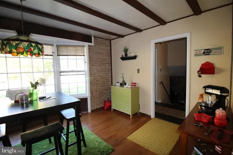 a workspace with furniture and a window