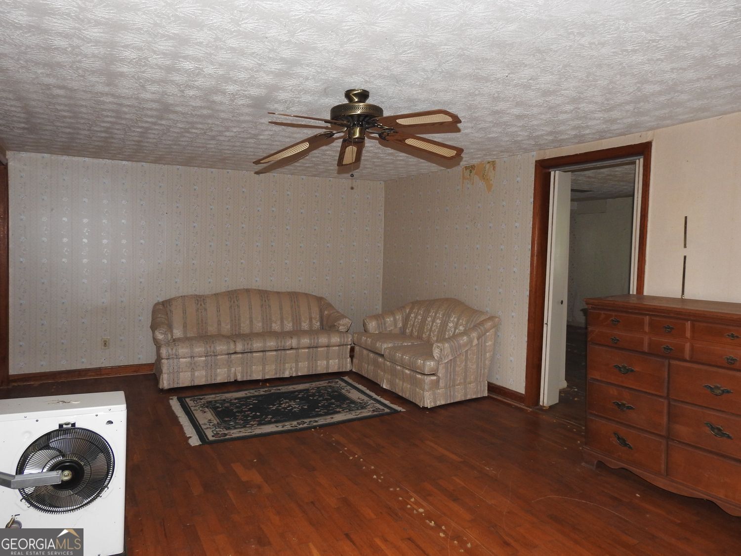 333 Lickskillet Road Epworth, GA 30541 - Photo 17 of 38 a bedroom with a bed and a dresser