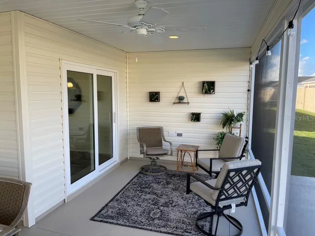 a workspace with furniture and window