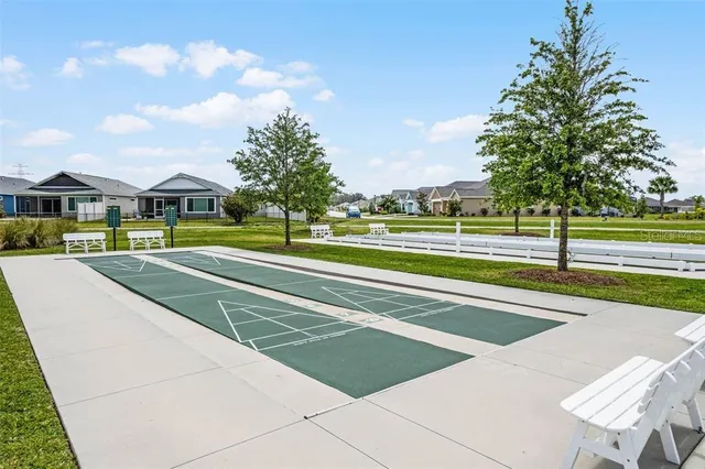 a picture of houses with a yard