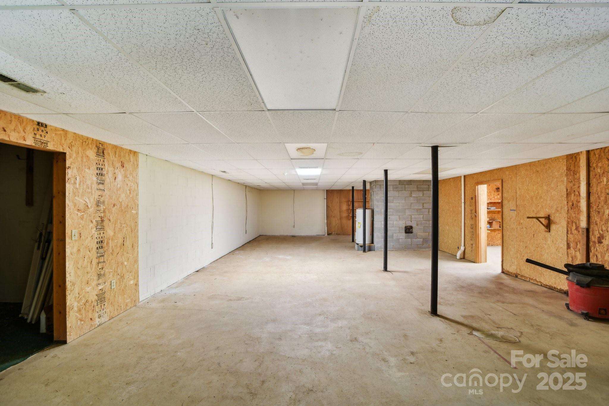 2281 Bearwallow Road Hendersonville, NC 28792 - Photo 25 of 46 a view of a hallway with a refrigerator