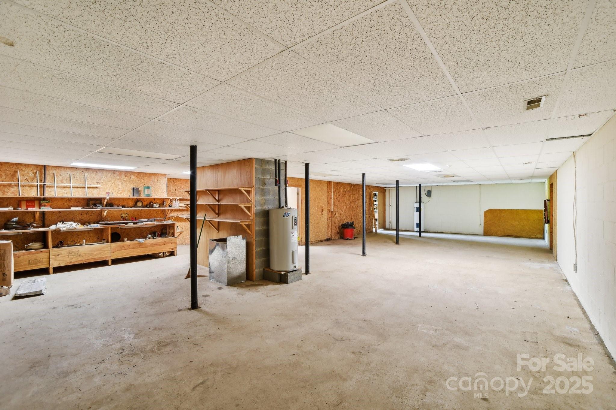 2281 Bearwallow Road Hendersonville, NC 28792 - Photo 26 of 46 a view of a garage with gym equipment