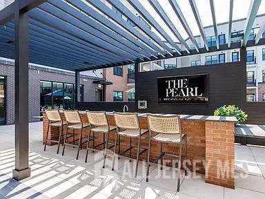 a outdoor space with lots of tables and chairs