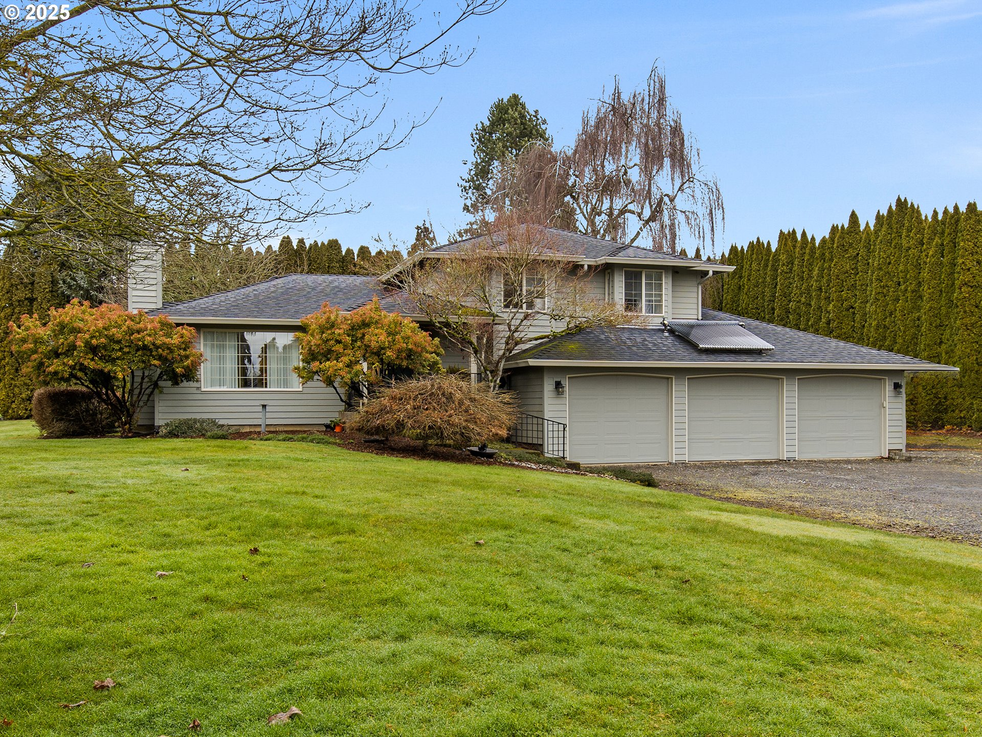 5906 Northwest 169th Street Ridgefield, WA 98642 - Photo 1 of 35 a view of a house with a garden