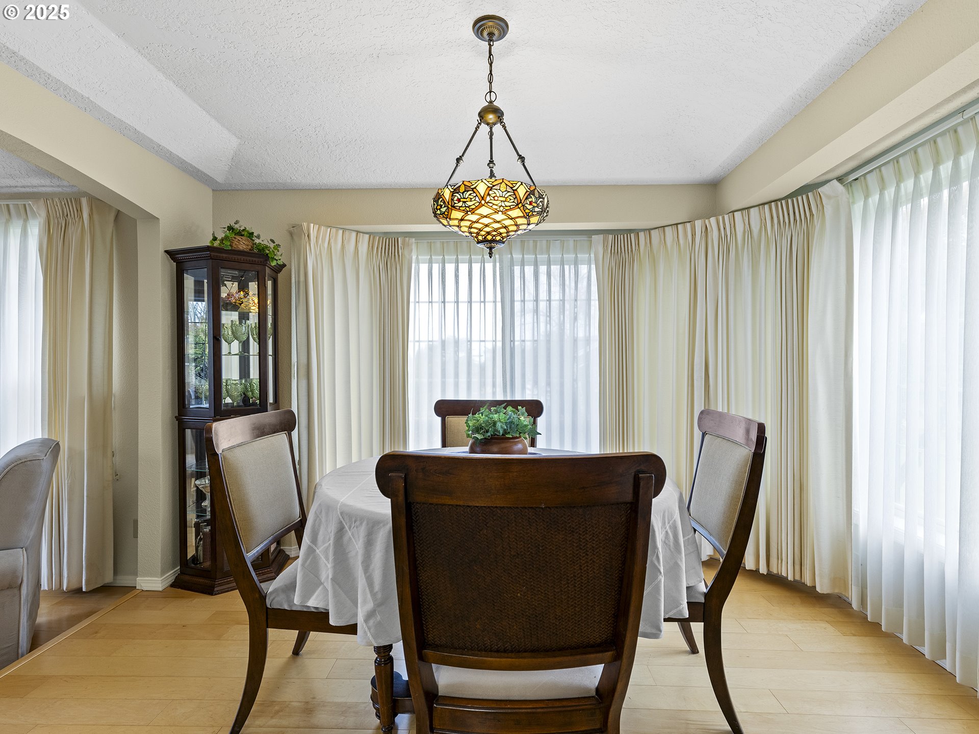 5906 Northwest 169th Street Ridgefield, WA 98642 - Photo 11 of 35 a dining room with furniture and window