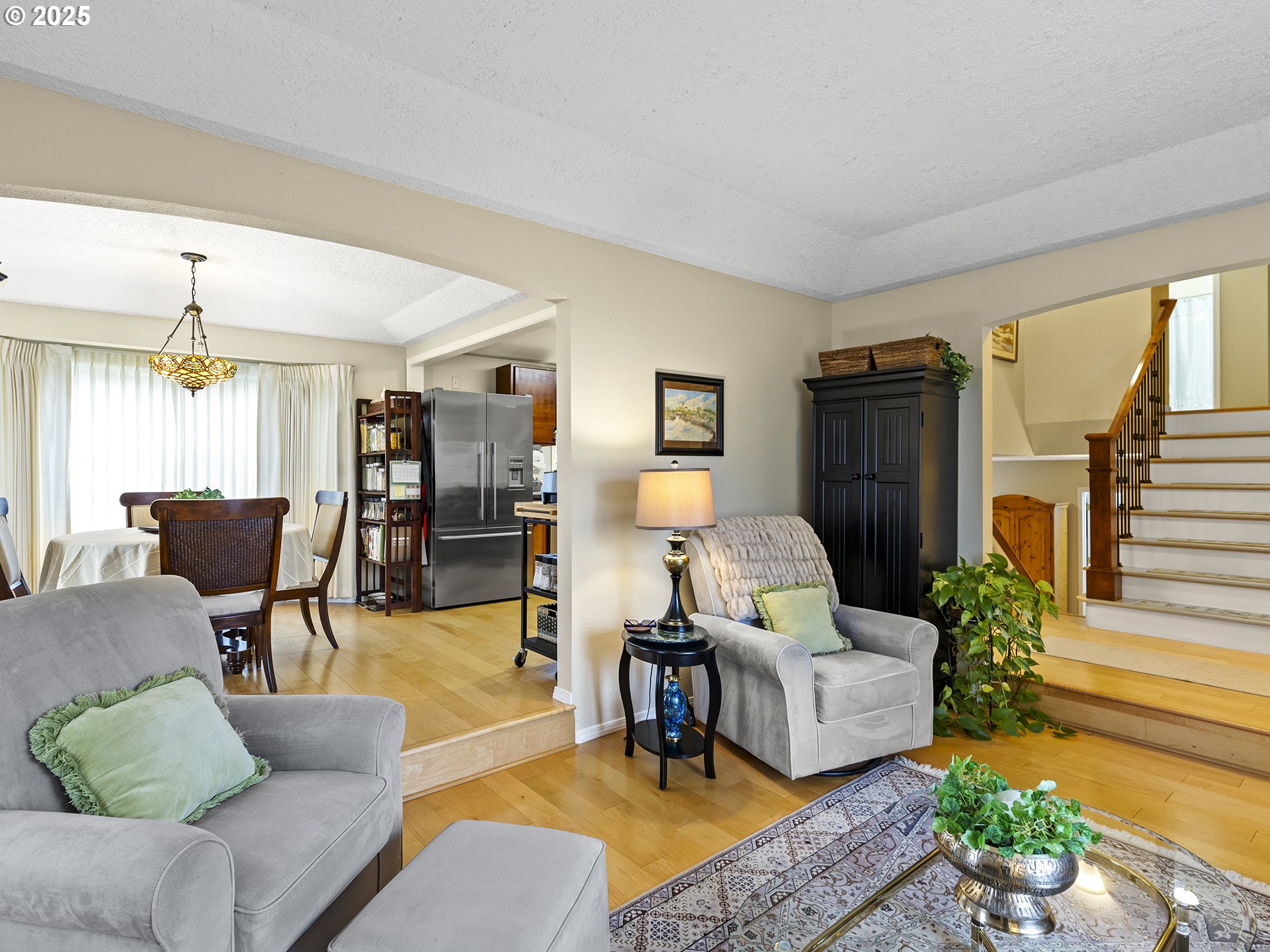 5906 Northwest 169th Street Ridgefield, WA 98642 - Photo 13 of 35 a living room with furniture and a fireplace