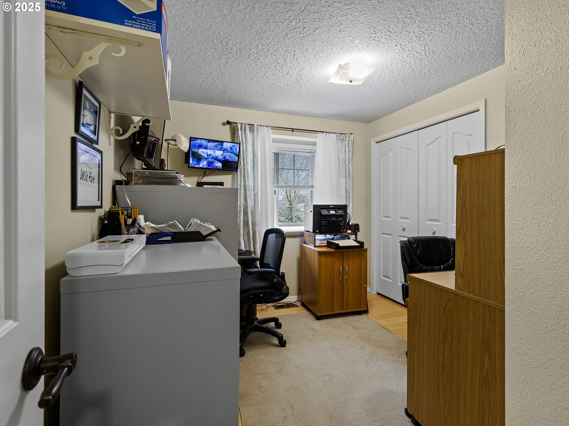 5906 Northwest 169th Street Ridgefield, WA 98642 - Photo 20 of 35 a view of workspace with workspace and windows