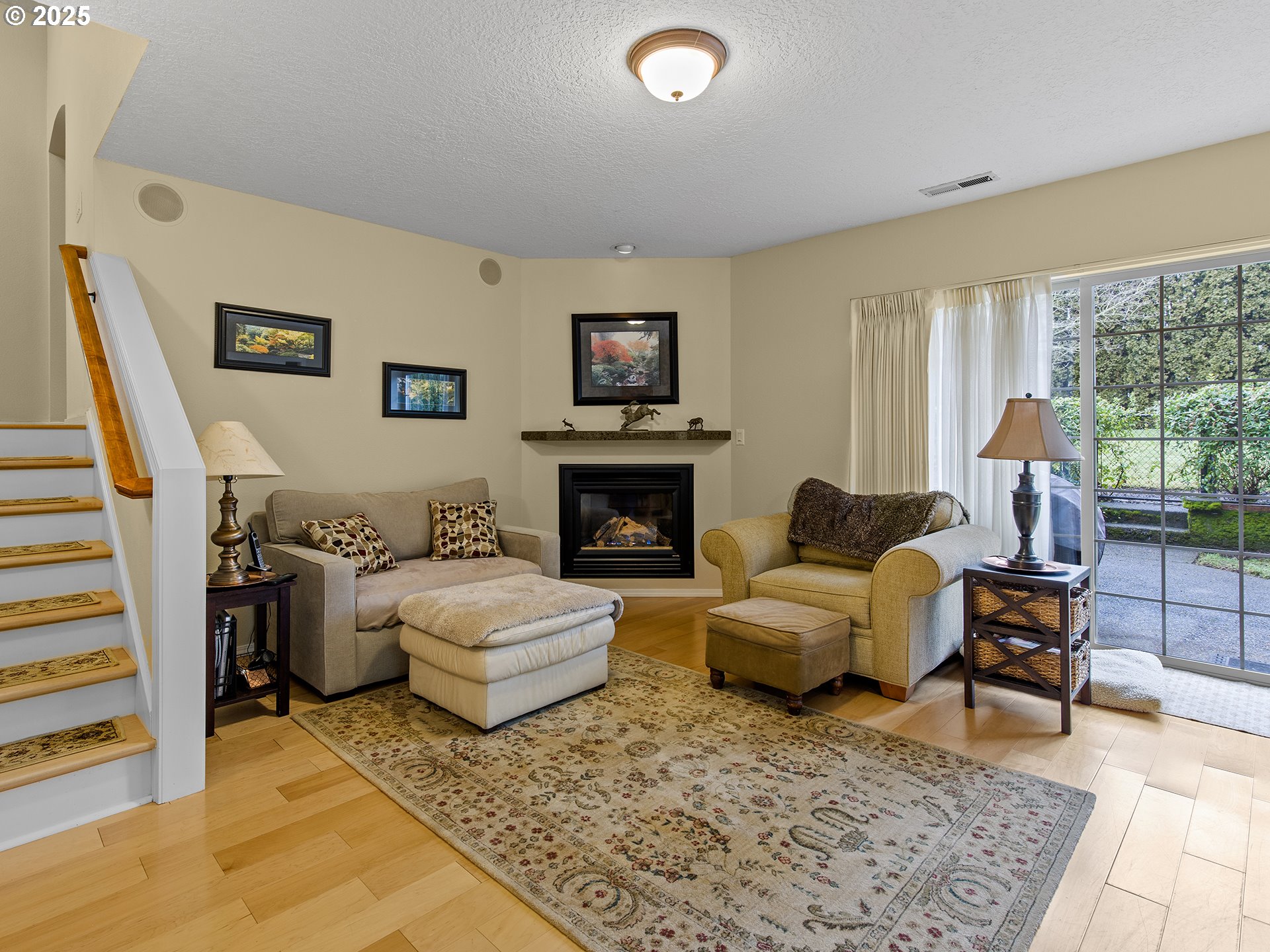 5906 Northwest 169th Street Ridgefield, WA 98642 - Photo 21 of 35 a living room with furniture and a fireplace