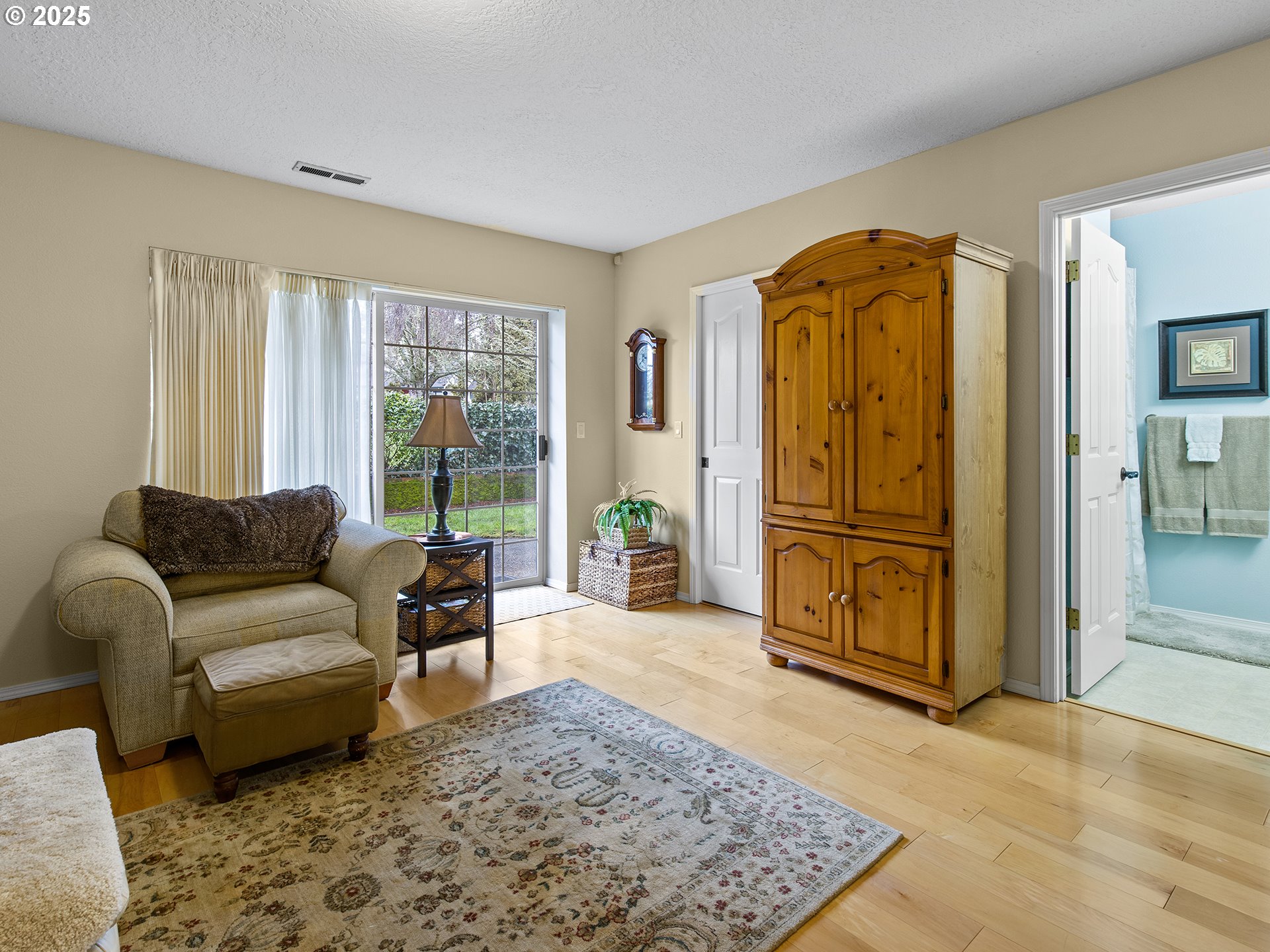5906 Northwest 169th Street Ridgefield, WA 98642 - Photo 22 of 35 a living room with furniture and a window