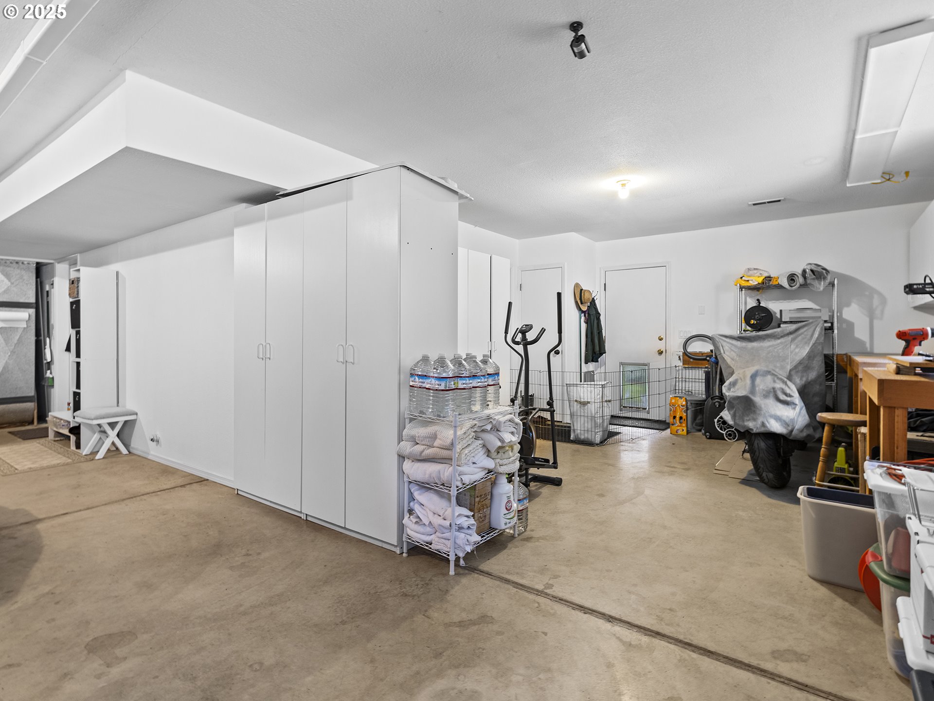 5906 Northwest 169th Street Ridgefield, WA 98642 - Photo 25 of 35 a view of a room with gym equipment