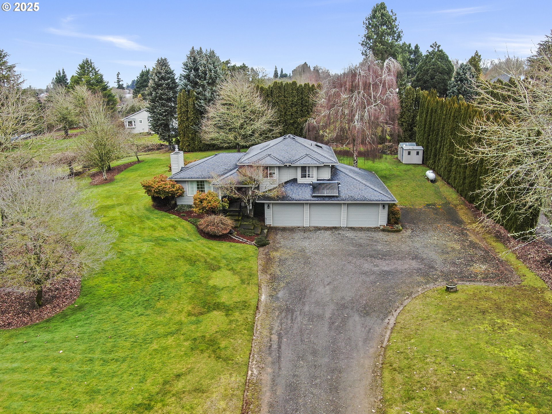 5906 Northwest 169th Street Ridgefield, WA 98642 - Photo 33 of 35 a view of a house with a yard
