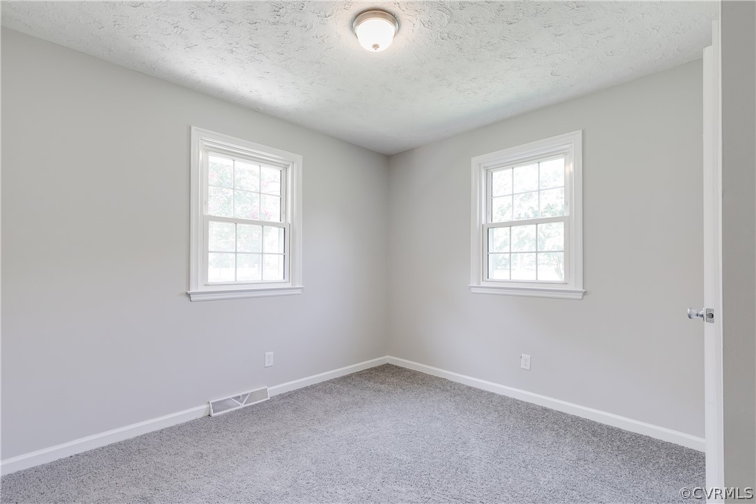 14911 Rowlett Road Chesterfield, VA 23838 - Photo 12 of 50 an empty room with windows
