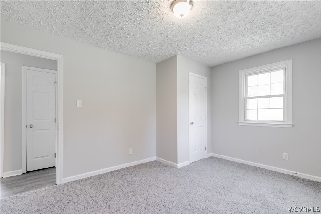 14911 Rowlett Road Chesterfield, VA 23838 - Photo 15 of 50 an empty room with windows