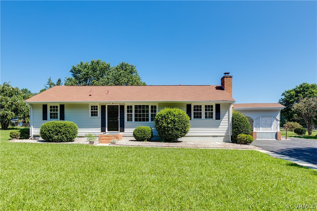 14911 Rowlett Road Chesterfield, VA 23838 - Photo 2 of 50 a front view of a house with a yard