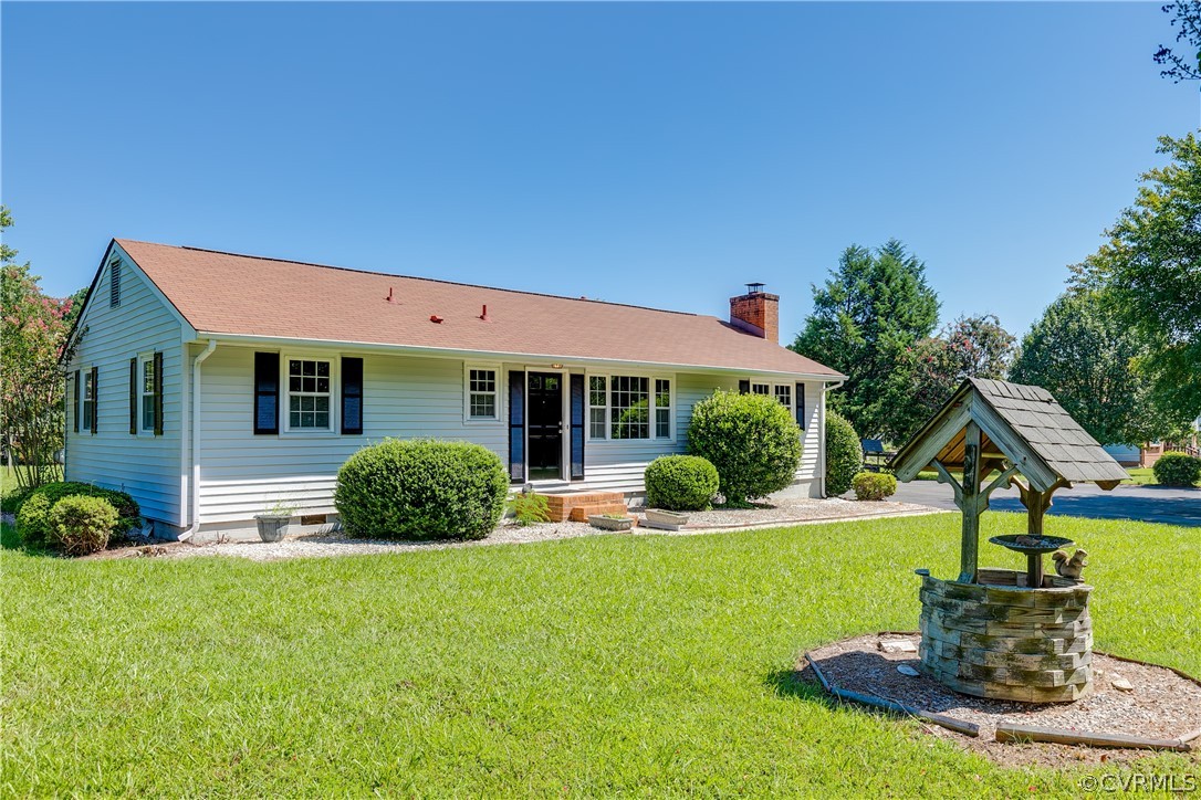 14911 Rowlett Road Chesterfield, VA 23838 - Photo 3 of 50 a front view of a house with a yard