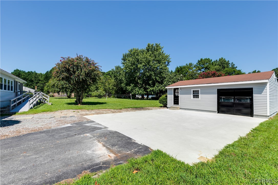 14911 Rowlett Road Chesterfield, VA 23838 - Photo 39 of 50 a view of a house with a yard and a large tree