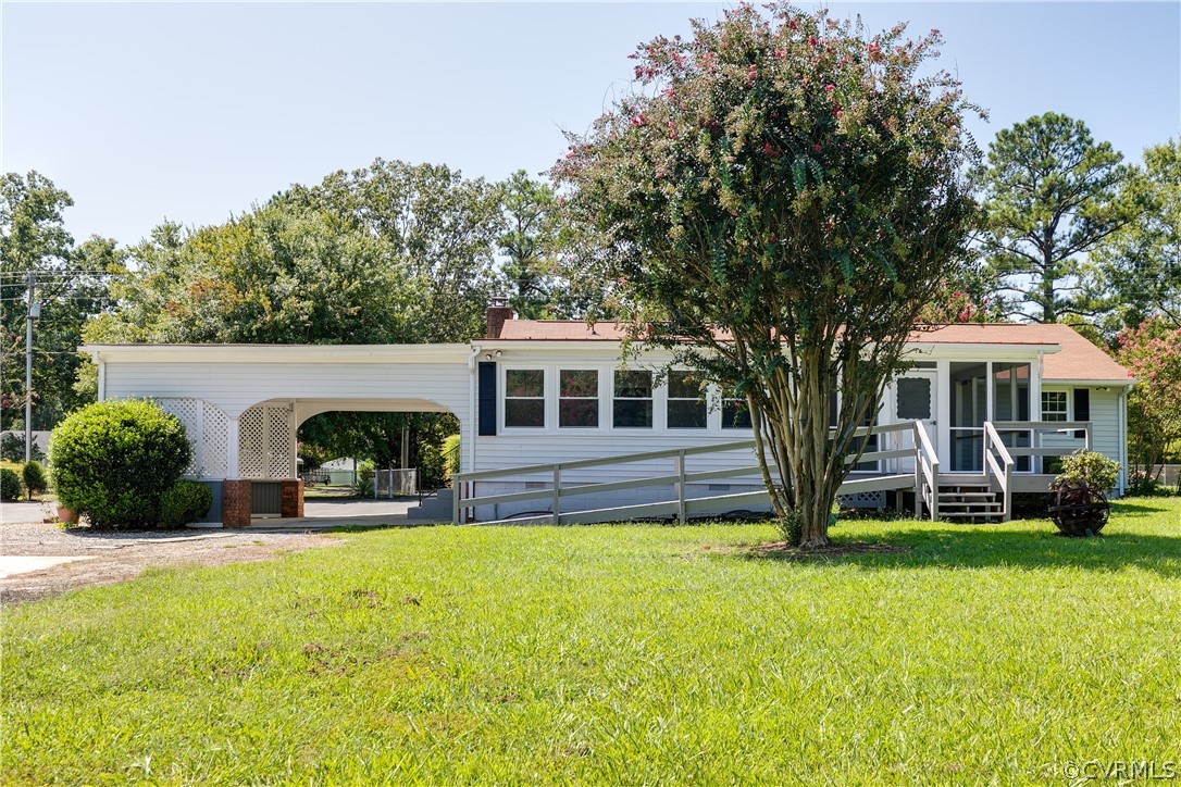 14911 Rowlett Road Chesterfield, VA 23838 - Photo 45 of 50 a front view of house with yard and green space