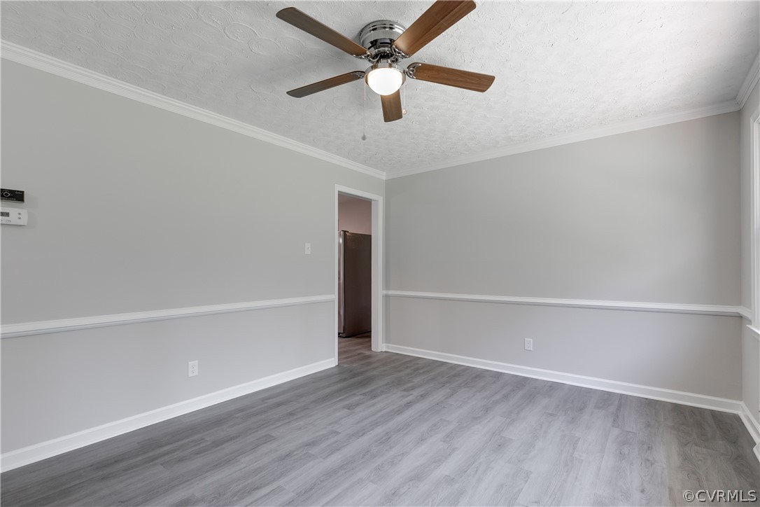 14911 Rowlett Road Chesterfield, VA 23838 - Photo 7 of 50 a view of an empty room with a window