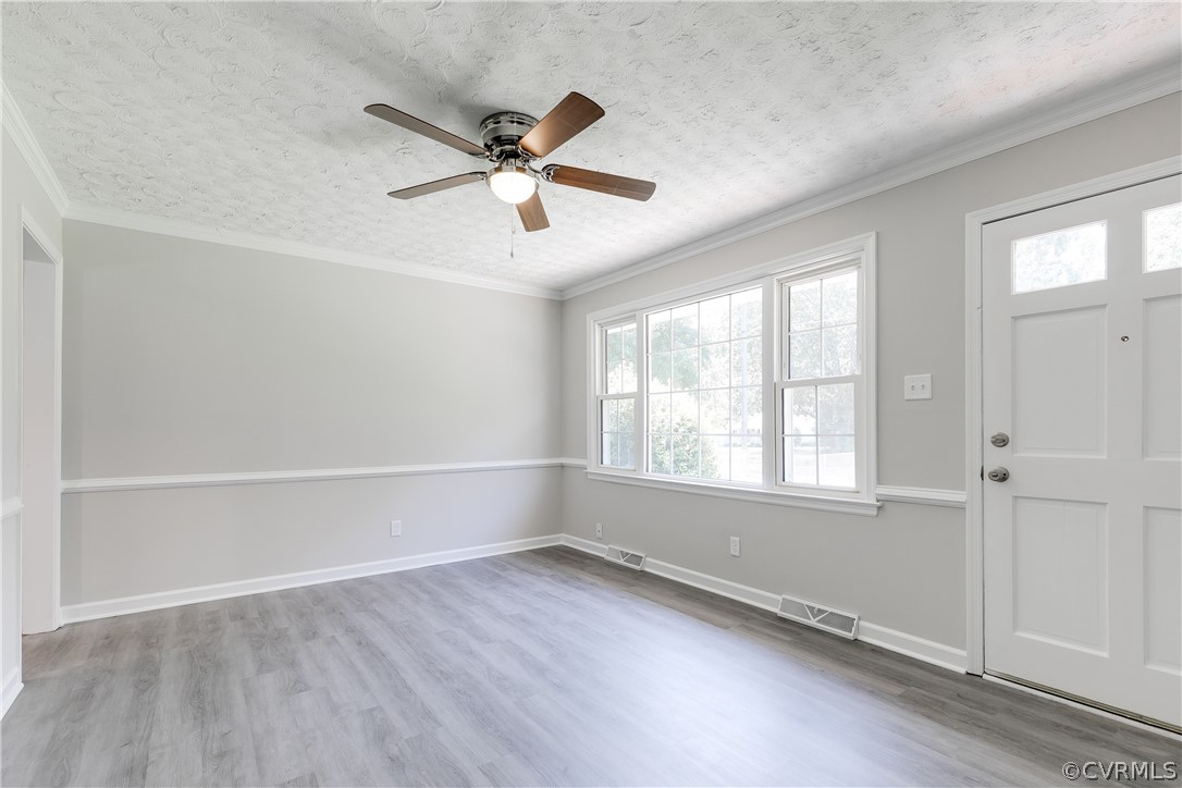 14911 Rowlett Road Chesterfield, VA 23838 - Photo 8 of 50 wooden floor in an empty room with a window
