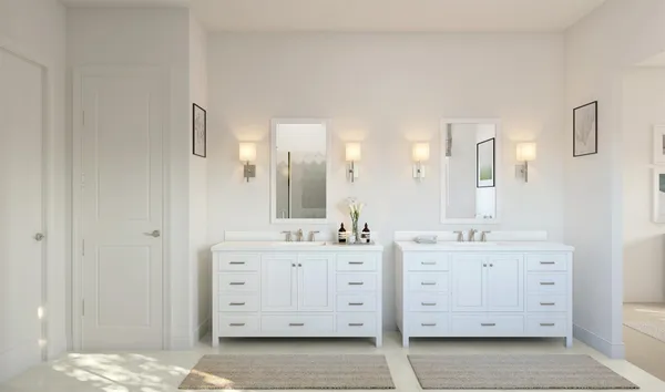 a spacious bathroom with a double vanity sink and mirror