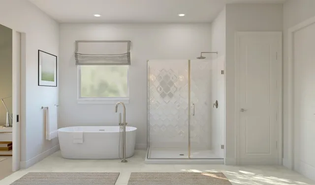 a bathroom with a tub shower and sink