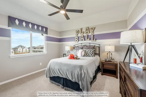 a bedroom with a bed a chandelier and a window