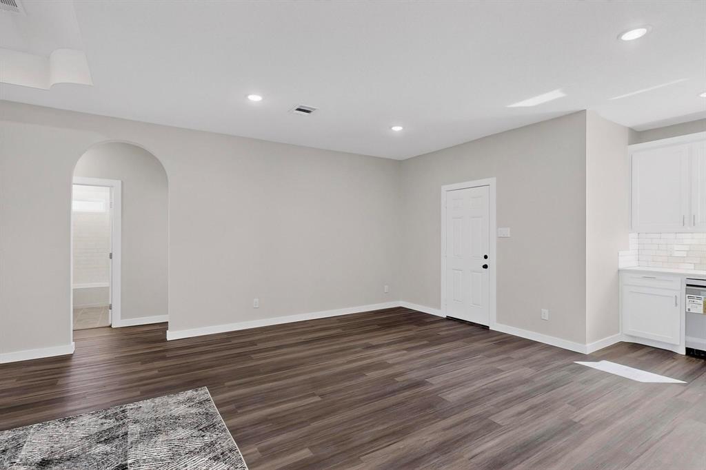 740 Section House Road Ennis, TX 75119 - Photo 11 of 37 a view of empty room with wooden floor