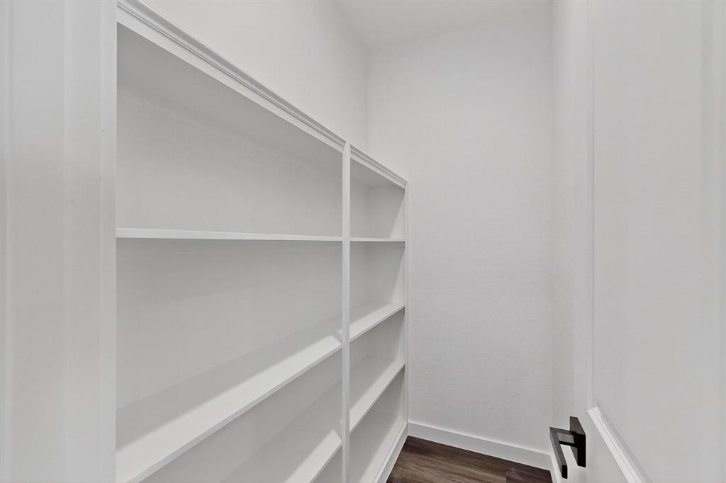 740 Section House Road Ennis, TX 75119 - Photo 17 of 37 a view of an empty walk in closet