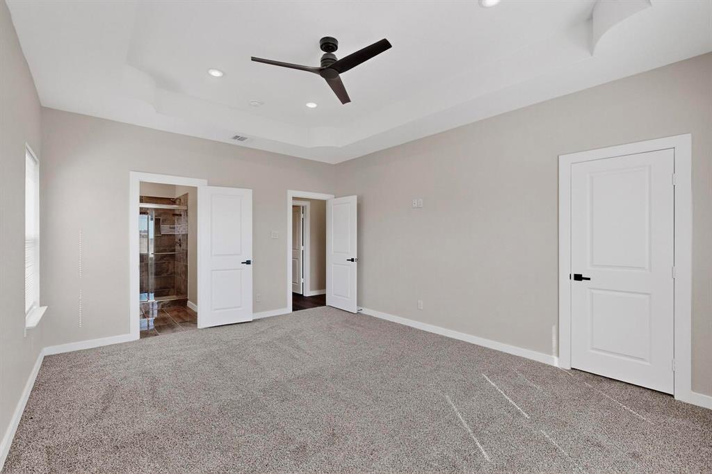 740 Section House Road Ennis, TX 75119 - Photo 21 of 37 a view of an empty room with glass door