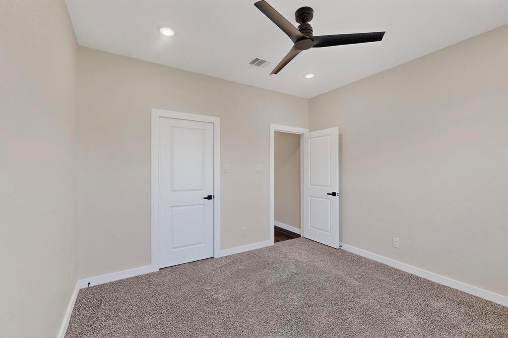 740 Section House Road Ennis, TX 75119 - Photo 28 of 37 a view of a livingroom with a ceiling fan and window