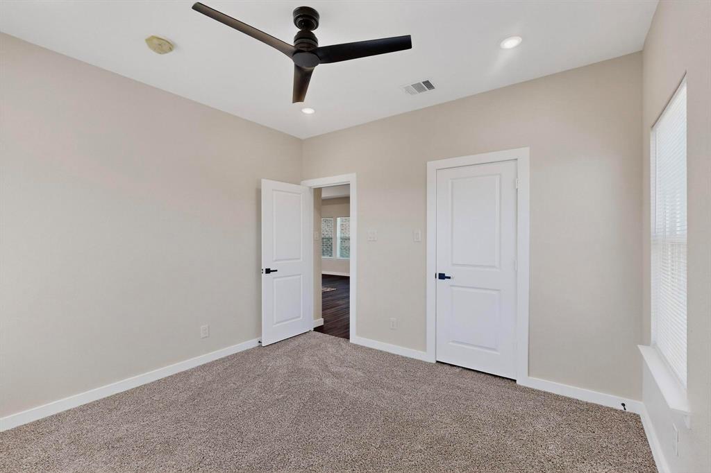 740 Section House Road Ennis, TX 75119 - Photo 30 of 37 an empty room with ceiling fan