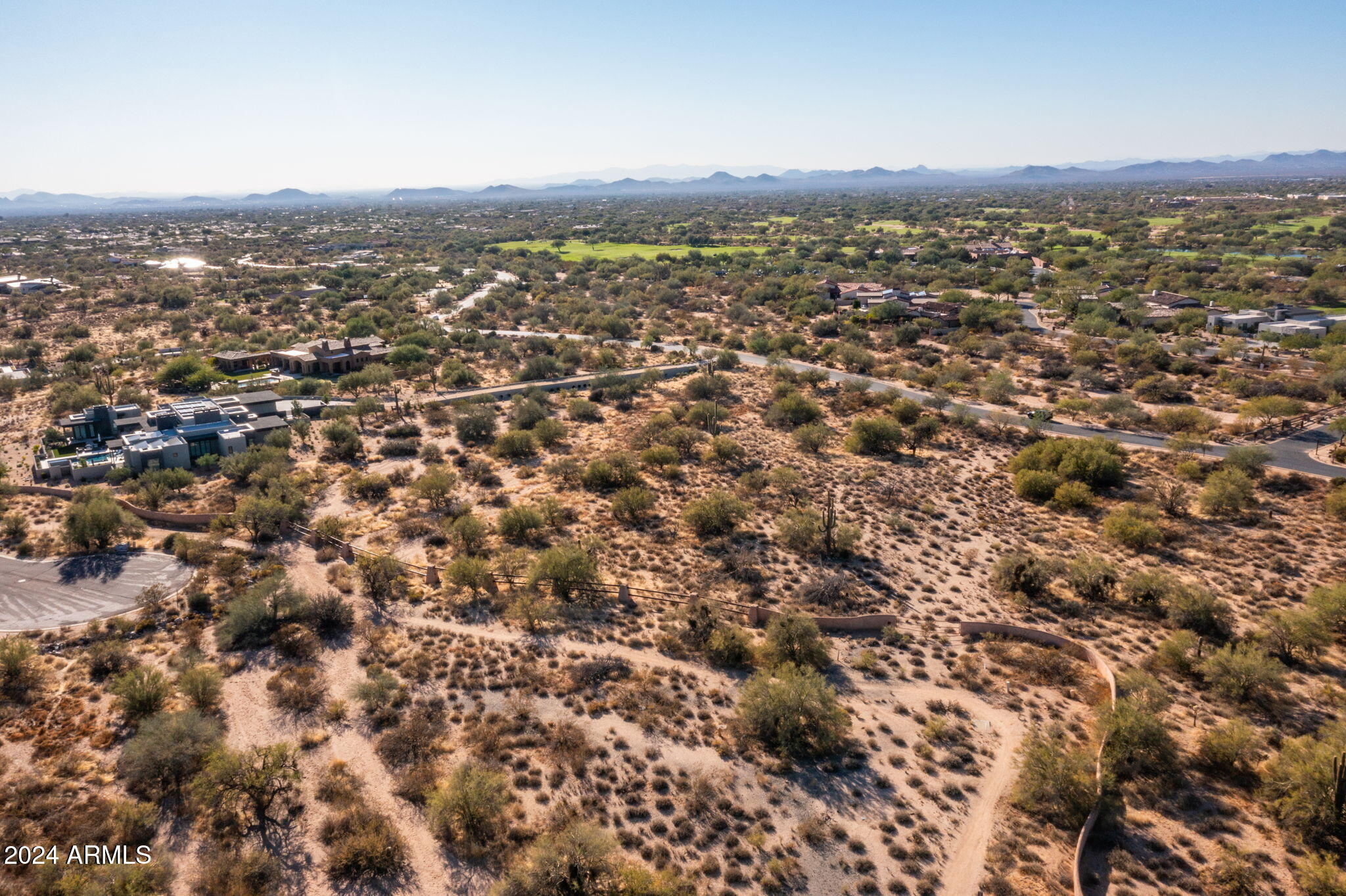 8190 East Ranch Road, Unit 183 Scottsdale, AZ 85266 - Photo 19 of 27 an aerial view of residential houses with city view
