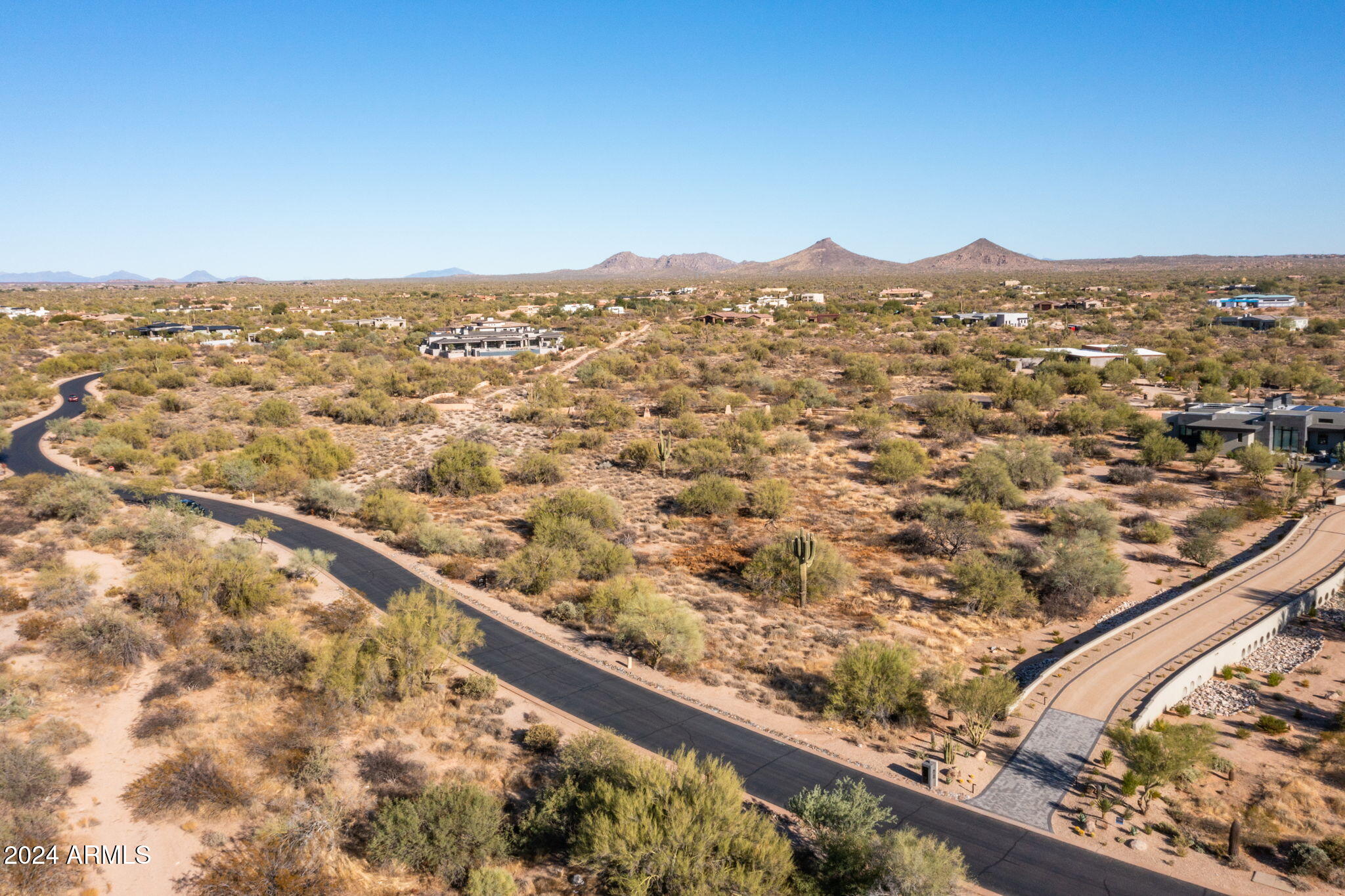 8190 East Ranch Road, Unit 183 Scottsdale, AZ 85266 - Photo 25 of 27 an aerial view of residential houses with outdoor space