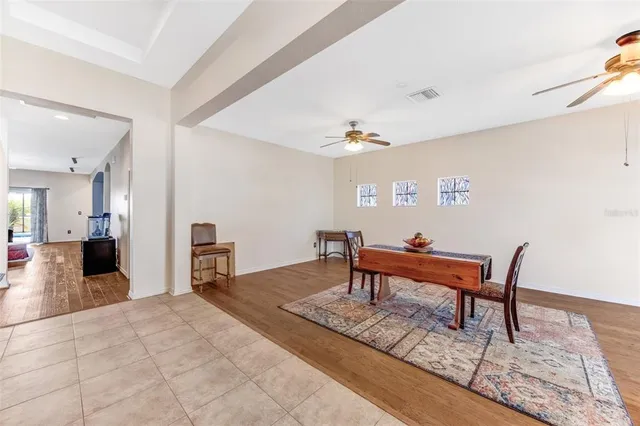 a view of a livingroom with furniture and wooden floor