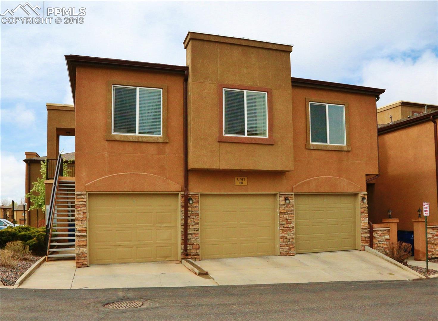 6967 Stetson Ranch Point, Unit 202 Colorado Springs, CO 80922 - Photo 1 of 5
