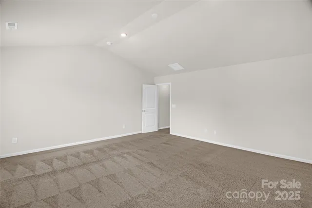 a bathroom with a granite countertop sink and vanity