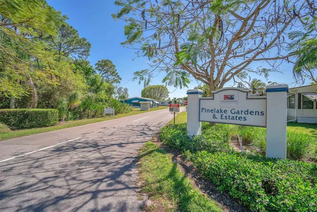 a sign that is on the side of a road