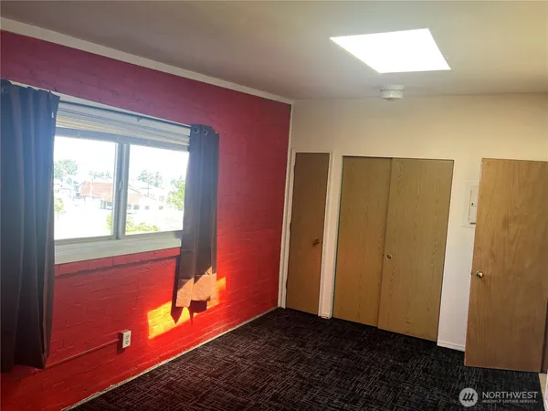 a view of empty room with a window