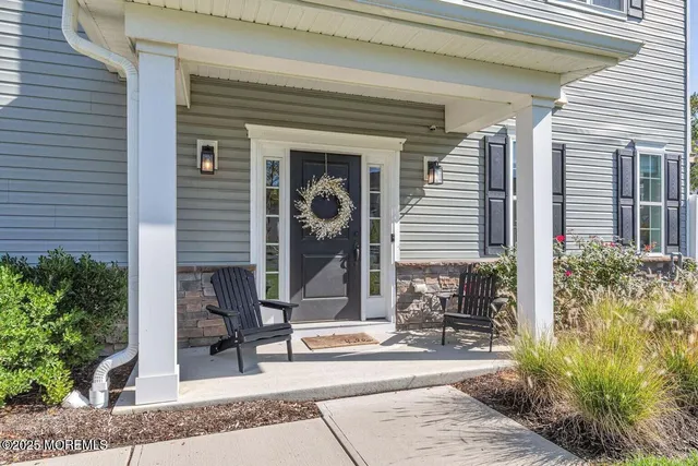 front view of a house with a patio