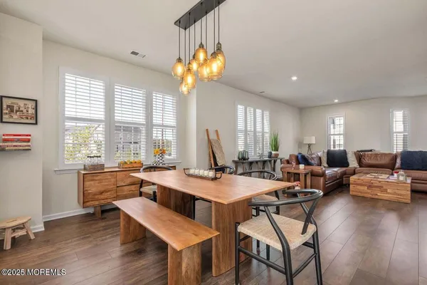 a room with furniture and a large window